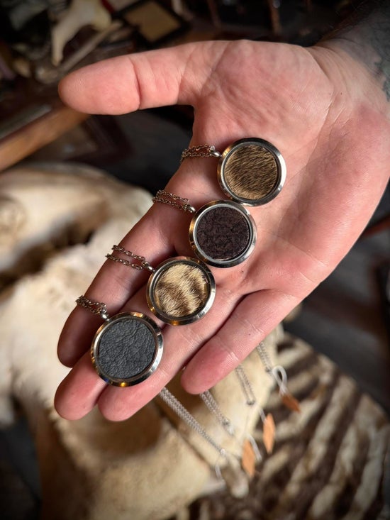 Antique African Hide Pendants